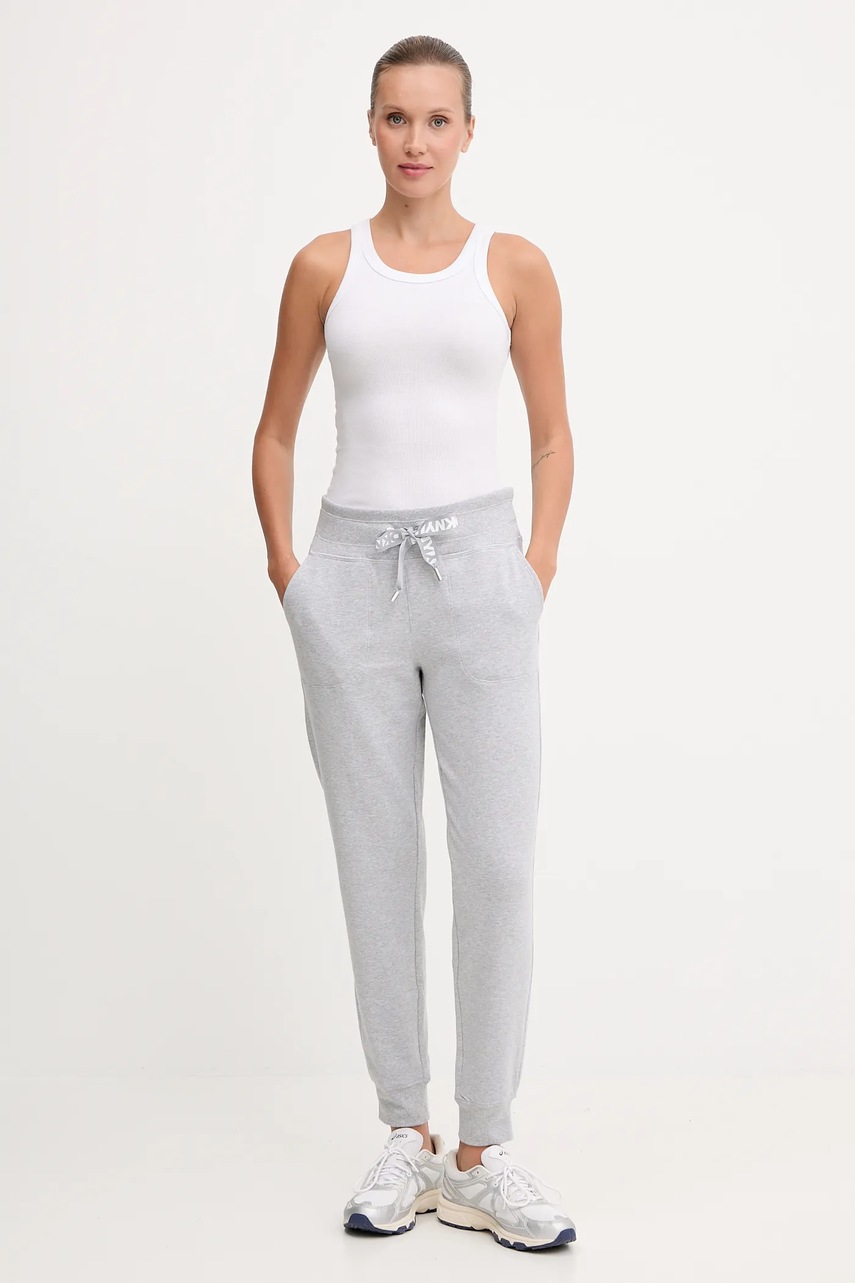 Спортивные штаны Dkny цвет бежевый однотонные DP5P3496