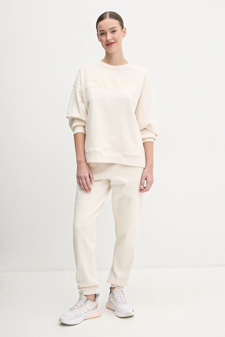 Спортивные штаны Dkny цвет бежевый с аппликацией DP5P3585 Спортивные штаны Dkny цвет бежевый с аппликацией DP5P3585