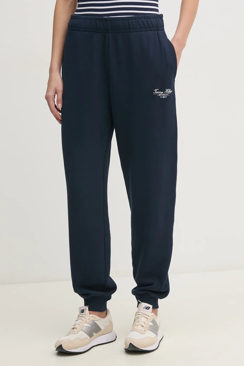 Levně Bavlněné tepláky Tommy Hilfiger tmavomodrá barva, s potiskem, WW0WW45576