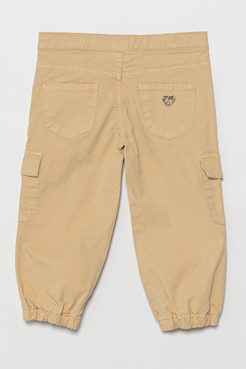 Дитячі штани Guess колір бежевий однотонні K5RB03 WFY91 Дитячі штани Guess колір бежевий однотонні K5RB03 WFY91