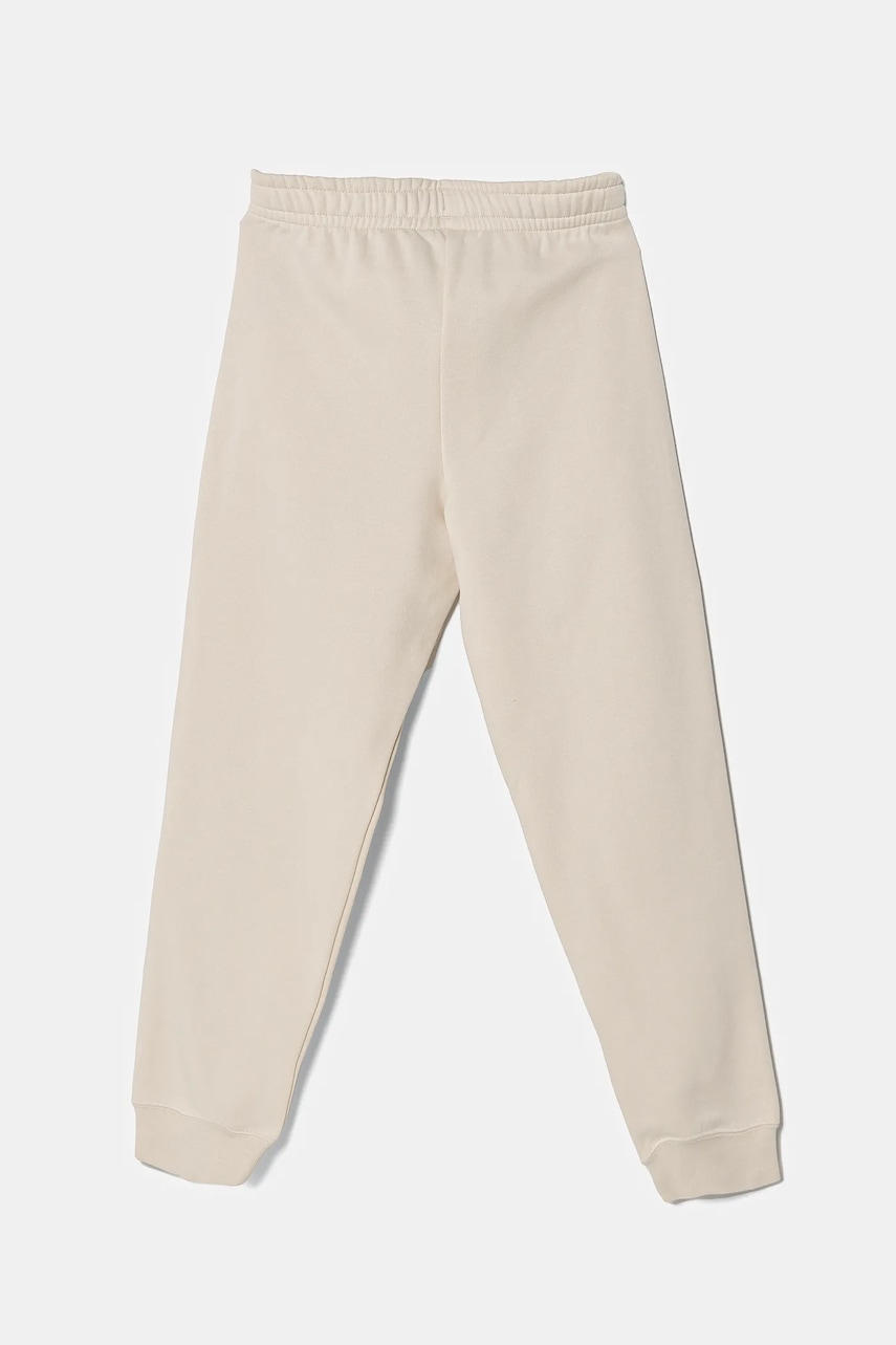 Детские спортивные штаны Puma ESS Sweatpants CL FL цвет бежевый однотонные 684898 Детские спортивные штаны Puma ESS Sweatpants CL FL цвет бежевый однотонные 684898