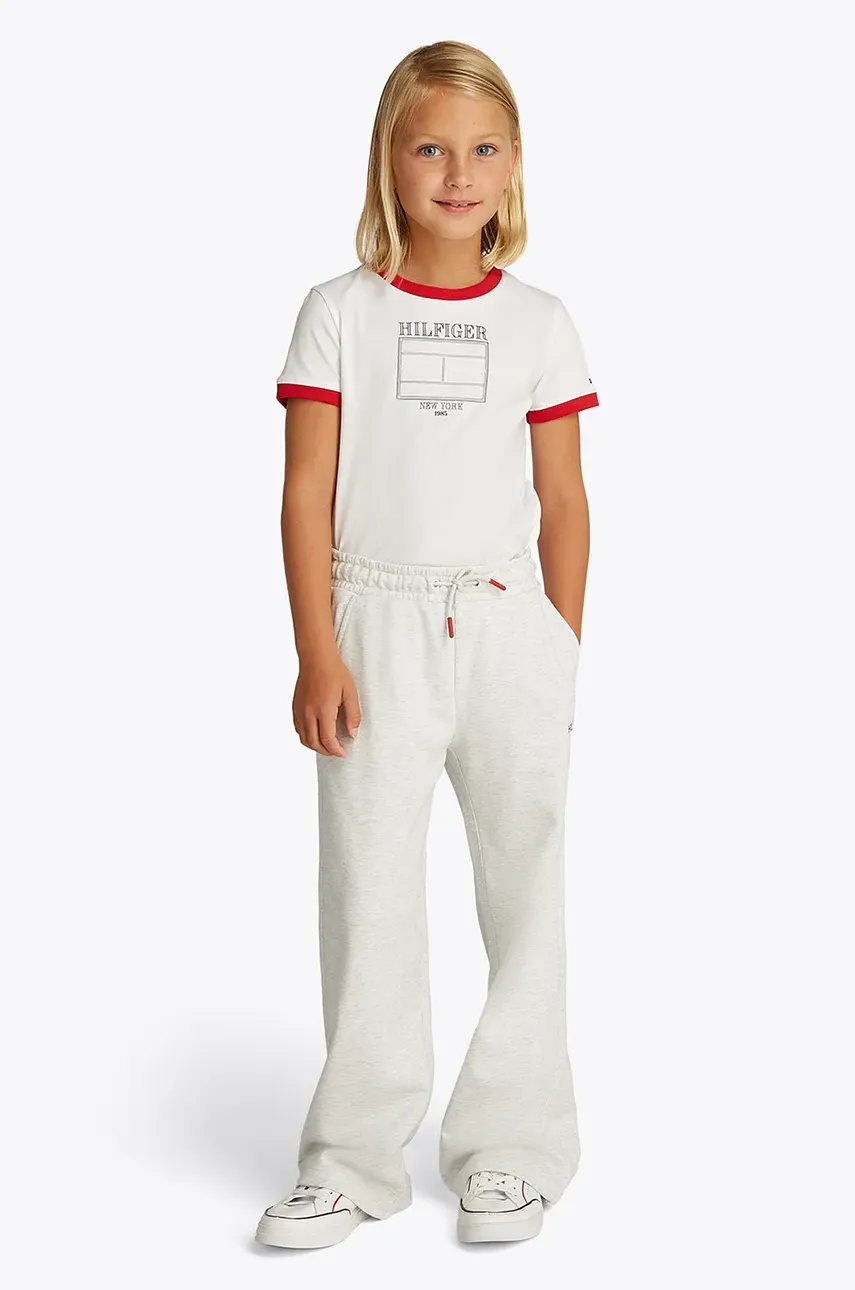 Levně Dětské tepláky Tommy Hilfiger bílá barva, hladké, KG0KG08422