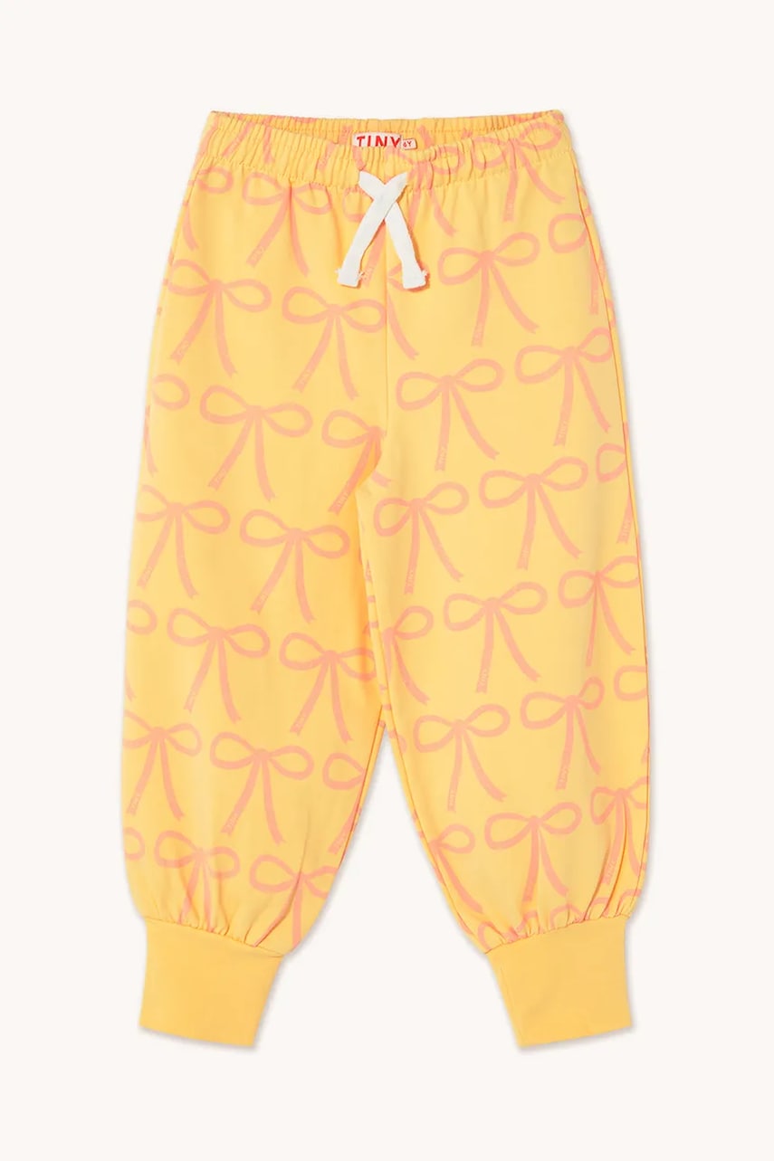 Tinycottons pantaloni de trening pentru copii BOWS SWEATPANT culoarea galben, modelator, SS25-057 Tinycottons pantaloni de trening pentru copii BOWS SWEATPANT culoarea galben, modelator, SS25-057