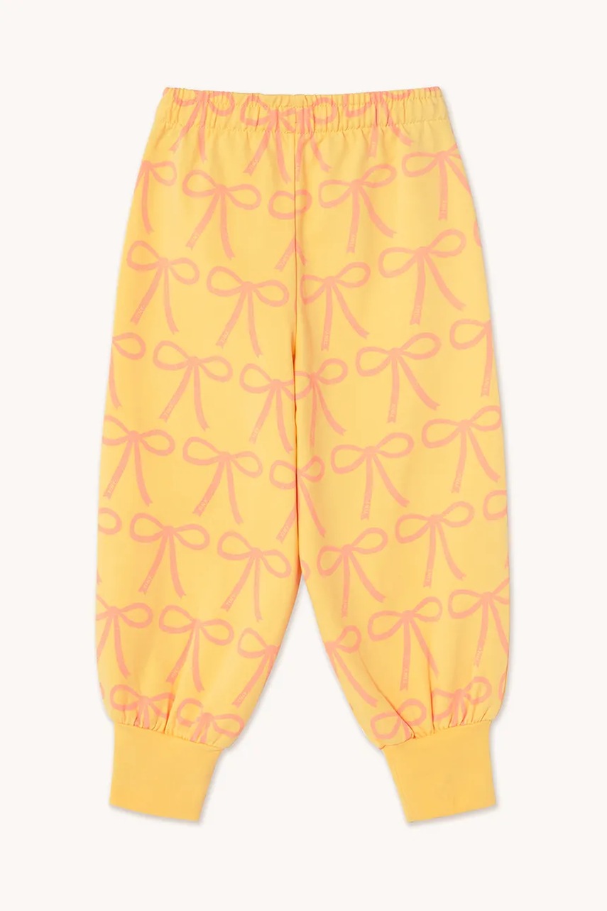 Дитячі спортивні штани Tinycottons BOWS SWEATPANT колір жовтий візерунок SS25-057