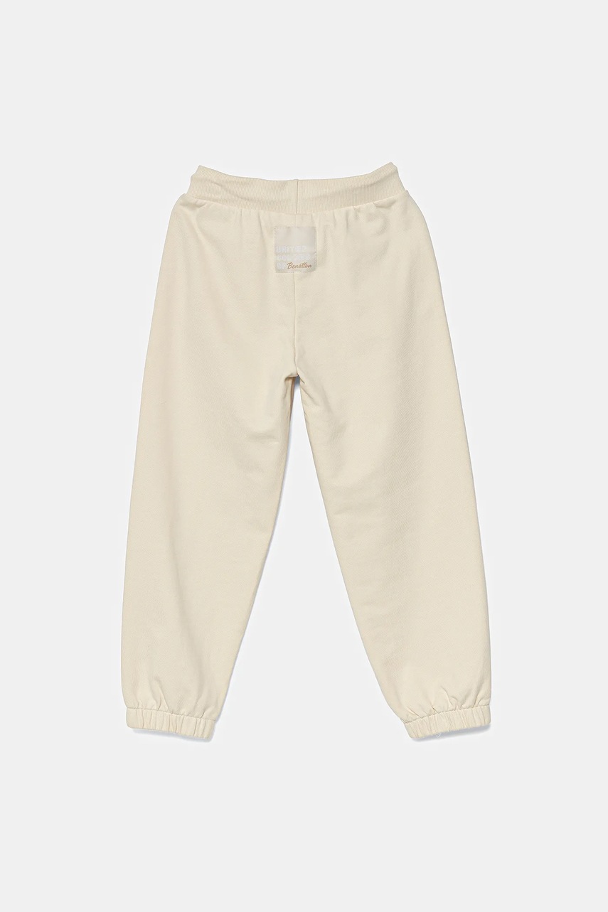 Детские хлопковые штаны United Colors of Benetton цвет бежевый однотонные 3UNICF060