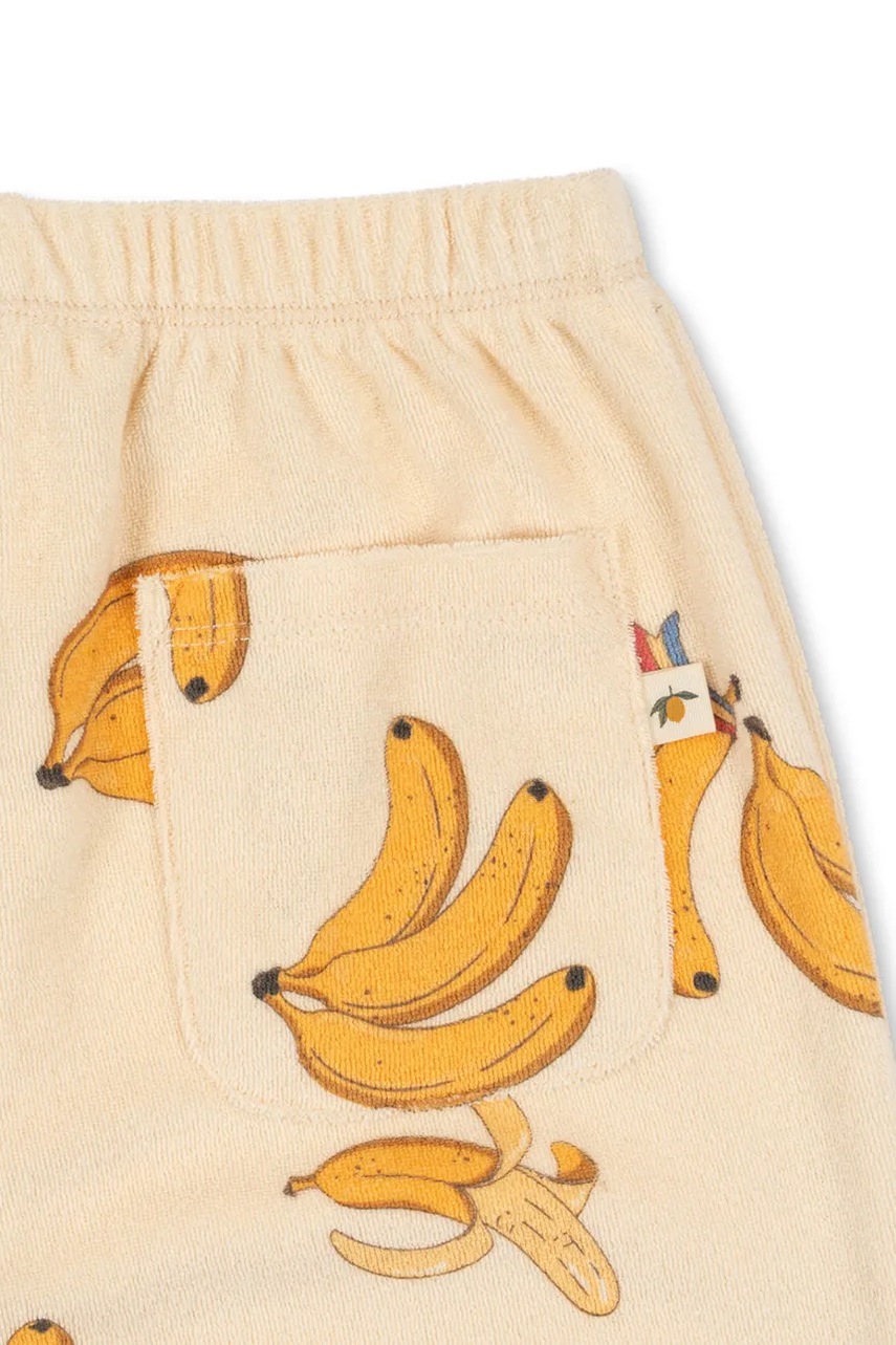 Детские спортивные штаны Konges Sløjd ITTY SWEAT PANTS GOTS цвет бежевый с узором KS102599