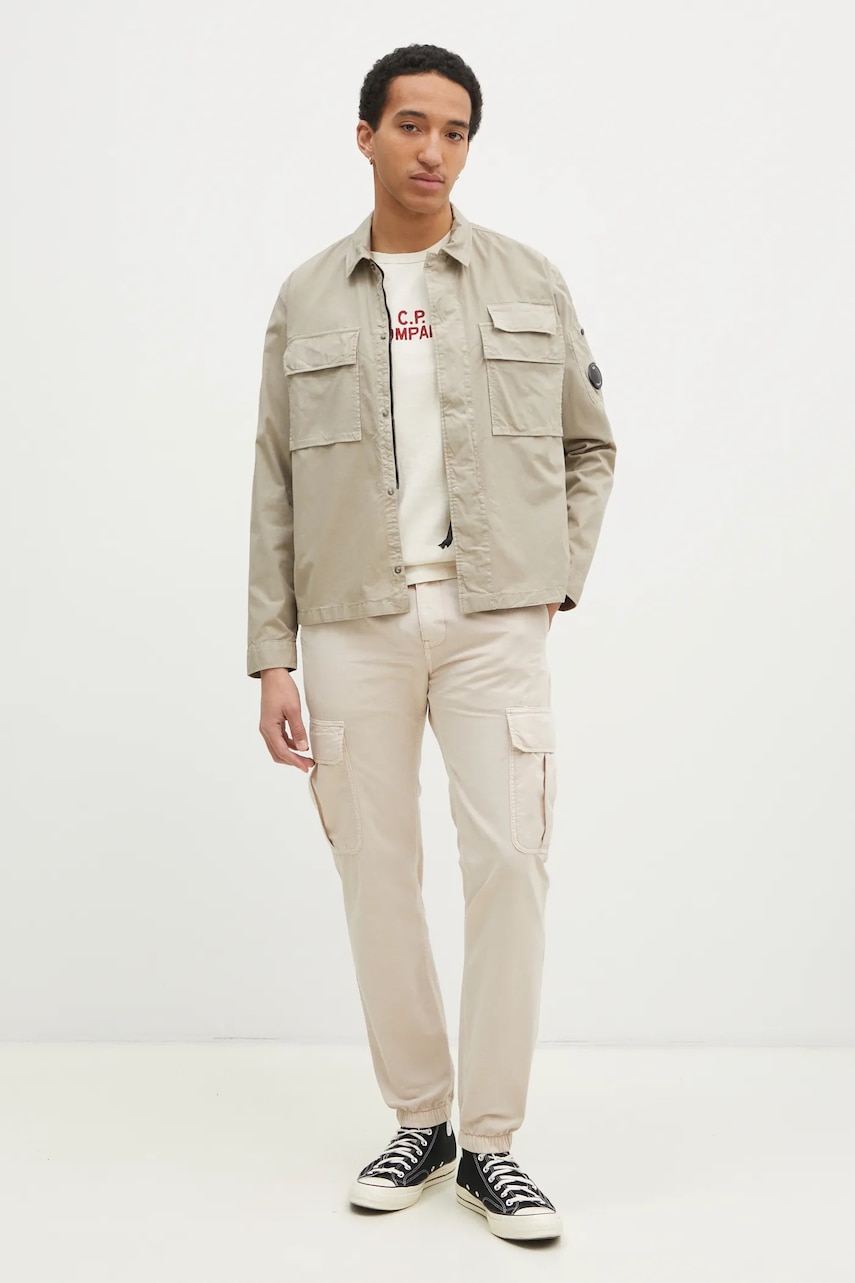 Хлопковые брюки Tommy Jeans цвет бежевый со шнуровкой DM0DM20284 Хлопковые брюки Tommy Jeans цвет бежевый со шнуровкой DM0DM20284