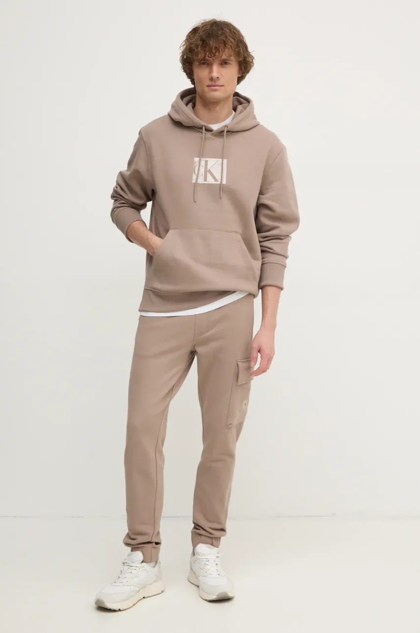 Хлопковые спортивные штаны Calvin Klein Jeans цвет бежевый однотонные J30J326762 Хлопковые спортивные штаны Calvin Klein Jeans цвет бежевый однотонные J30J326762