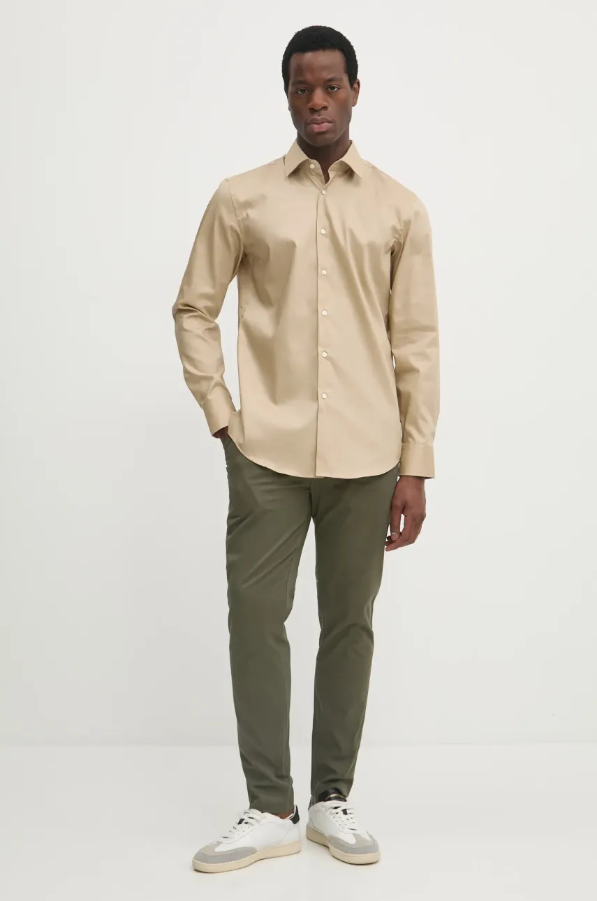 Брюки Calvin Klein мужские цвет зелёный облегающие K10K113423 Брюки Calvin Klein мужские цвет зелёный облегающие K10K113423