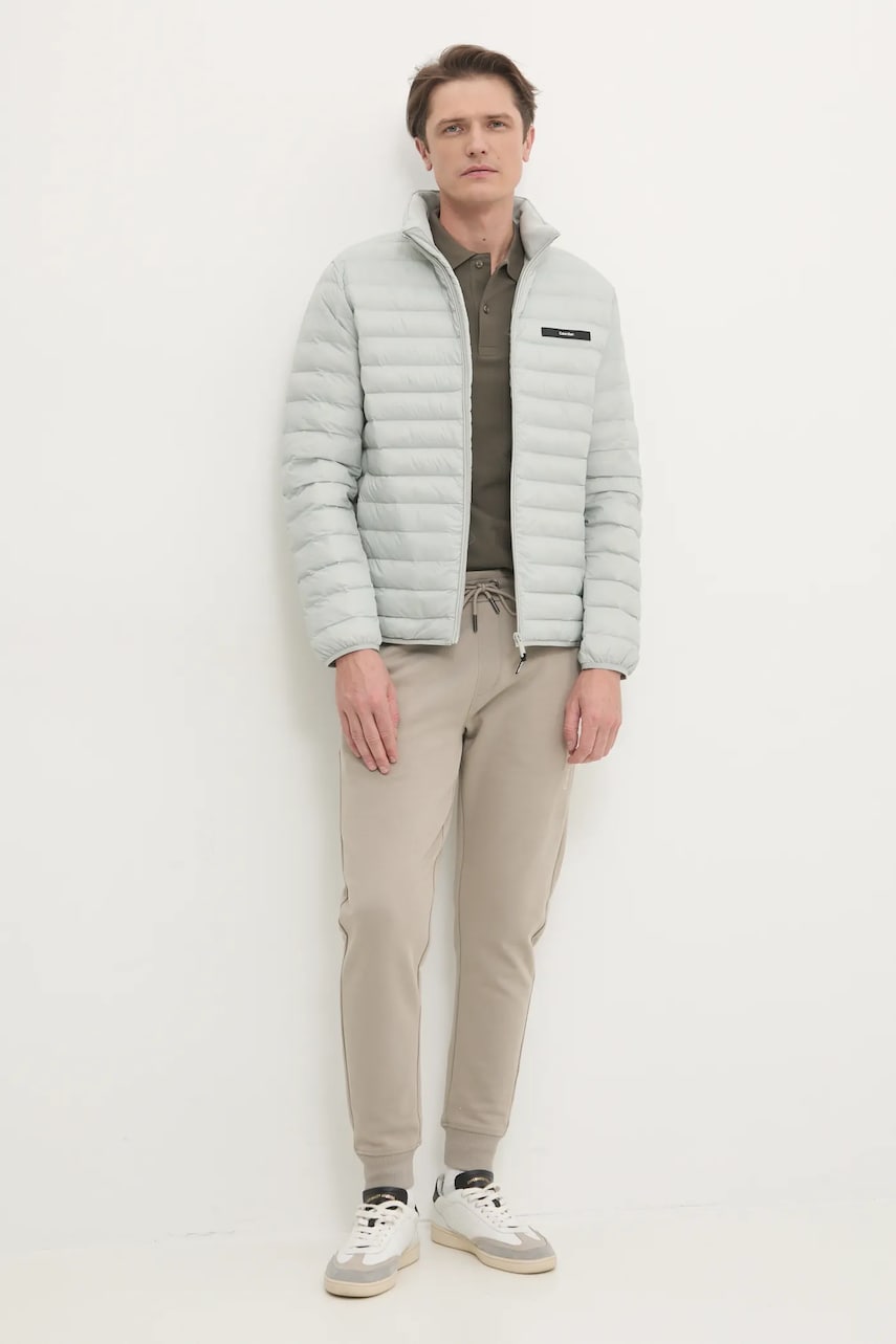Хлопковые спортивные штаны Calvin Klein цвет бежевый однотонные K10K113838 Хлопковые спортивные штаны Calvin Klein цвет бежевый однотонные K10K113838