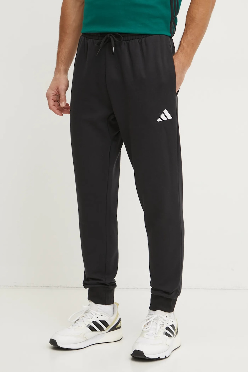 adidas pantaloni de trening Feelcozy culoarea negru, neted, JE3815 adidas pantaloni de trening Feelcozy culoarea negru, neted, JE3815