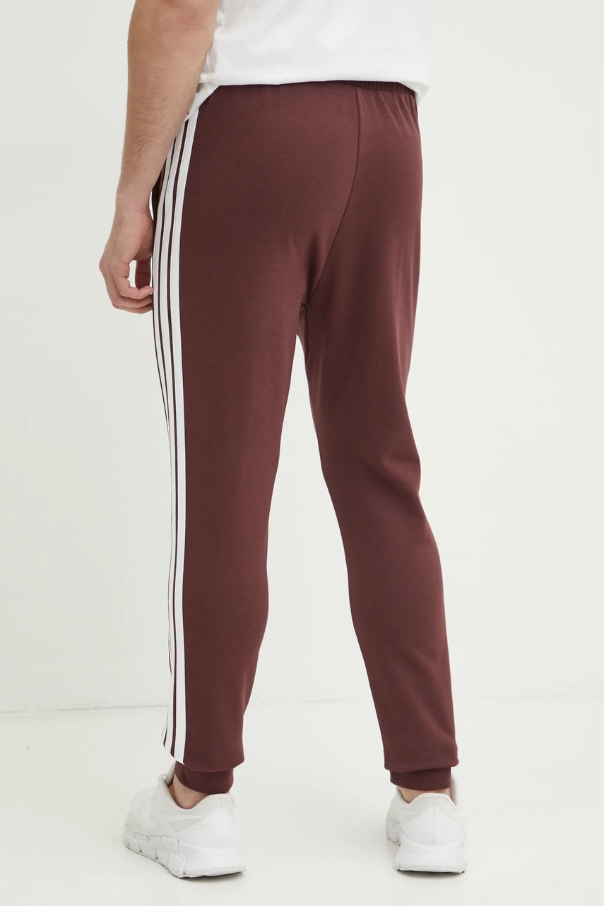 Παντελόνι φόρμας adidas Essentials χρώμα: μπορντό, JD1853 φωτογραφία