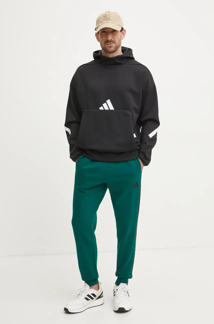 Спортивные штаны adidas Essentials цвет зелёный с узором JD1860 Спортивные штаны adidas Essentials цвет зелёный с узором JD1860