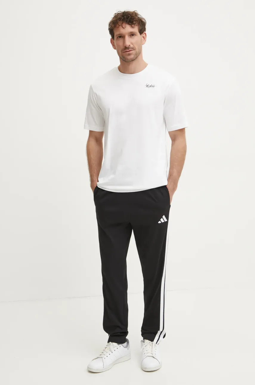 Спортивные штаны adidas Essentials цвет чёрный с аппликацией JE6430 Спортивные штаны adidas Essentials цвет чёрный с аппликацией JE6430