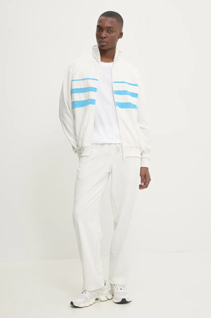 Спортивные штаны adidas Originals Q12 MONOGRAM TR цвет бежевый JP4429 Спортивные штаны adidas Originals Q12 MONOGRAM TR цвет бежевый JP4429