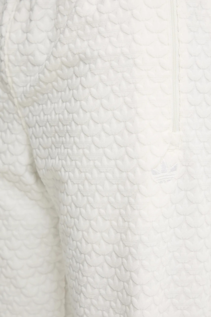 Tepláky adidas Originals Q12 MONOGRAM TR