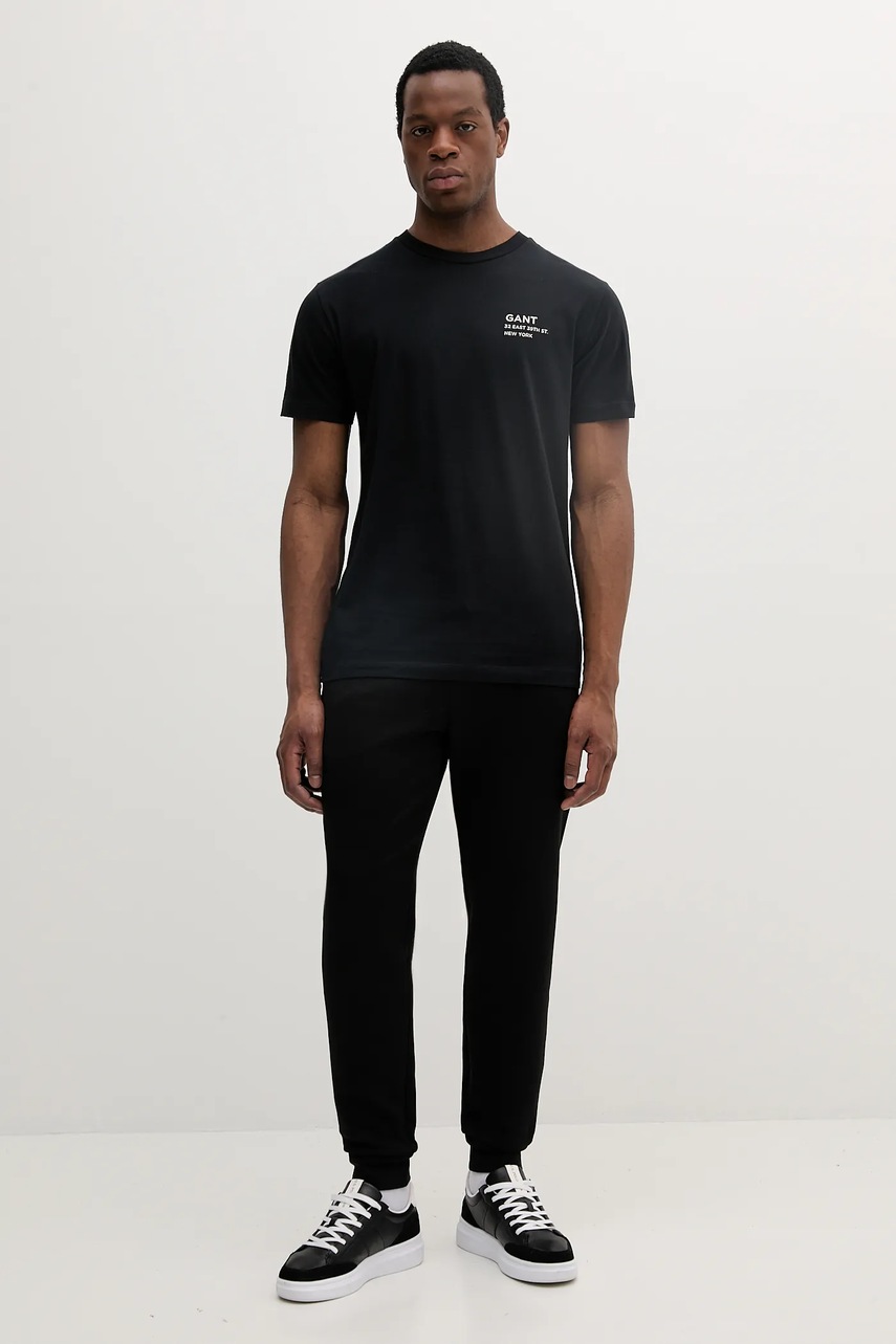 Спортивные штаны Armani Exchange мужские цвет чёрный однотонные XM000373 AF10818 Спортивные штаны Armani Exchange мужские цвет чёрный однотонные XM000373 AF10818