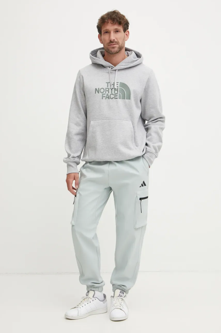 Спортивные штаны adidas City Escape мужские цвет зелёный с принтом JF3286 Спортивные штаны adidas City Escape мужские цвет зелёный с принтом JF3286
