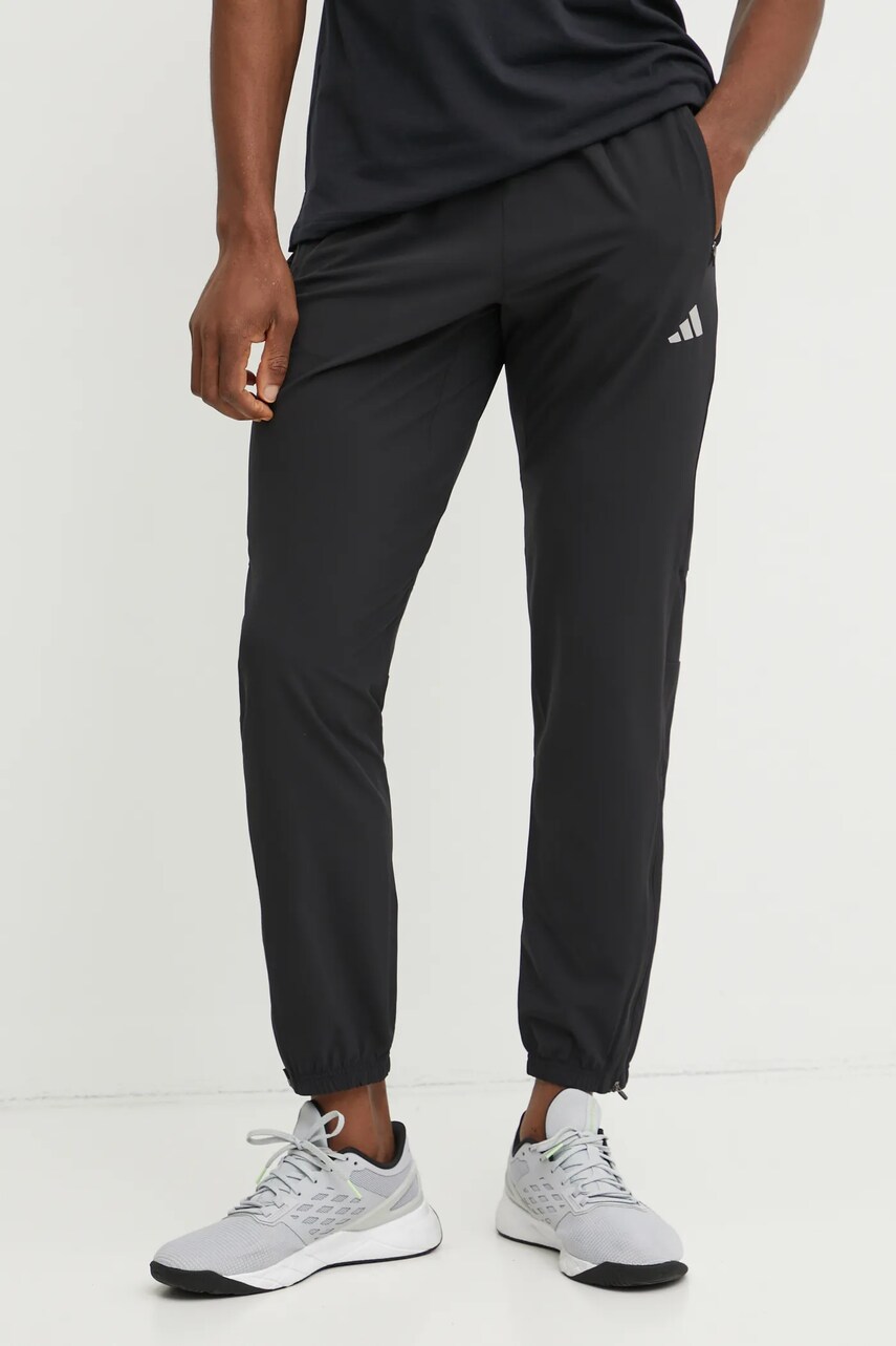 Levně Běžecké kalhoty adidas Performance Run It černá barva, IL7187