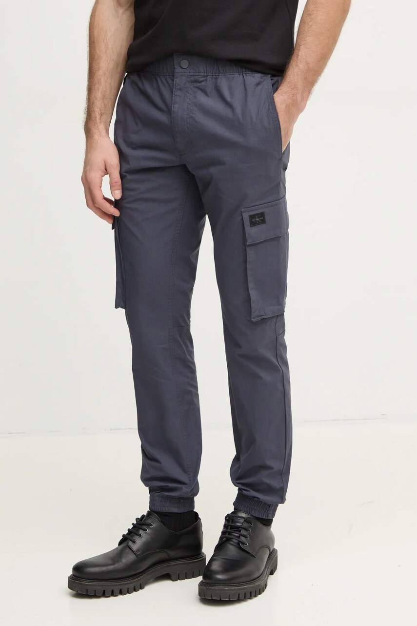 Levně Kalhoty Calvin Klein Jeans pánské, tmavomodrá barva, přiléhavé, J30J327614