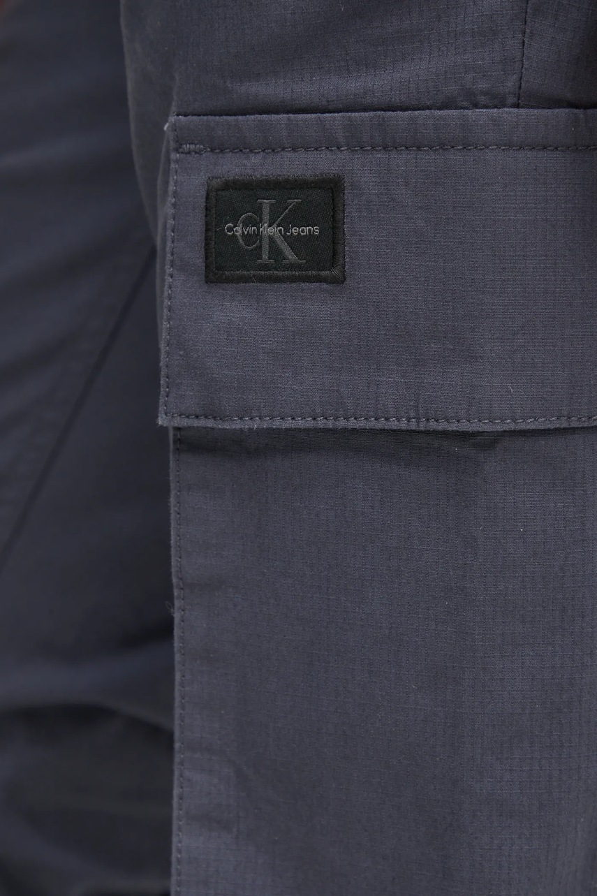 Штани Calvin Klein Jeans чоловічі колір синій облягаючі J30J327614 