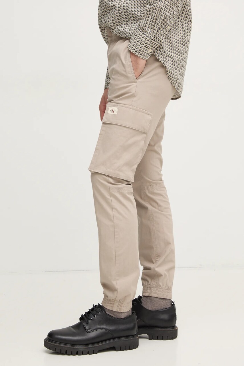 Levně Kalhoty Calvin Klein Jeans pánské, šedá barva, přiléhavé, J30J327614