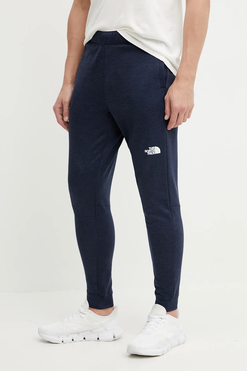 The North Face pantaloni de trening Reaxion culoarea albastru marin, melanj, NF0A8CNQ8Q01 The North Face pantaloni de trening Reaxion culoarea albastru marin, melanj, NF0A8CNQ8Q01