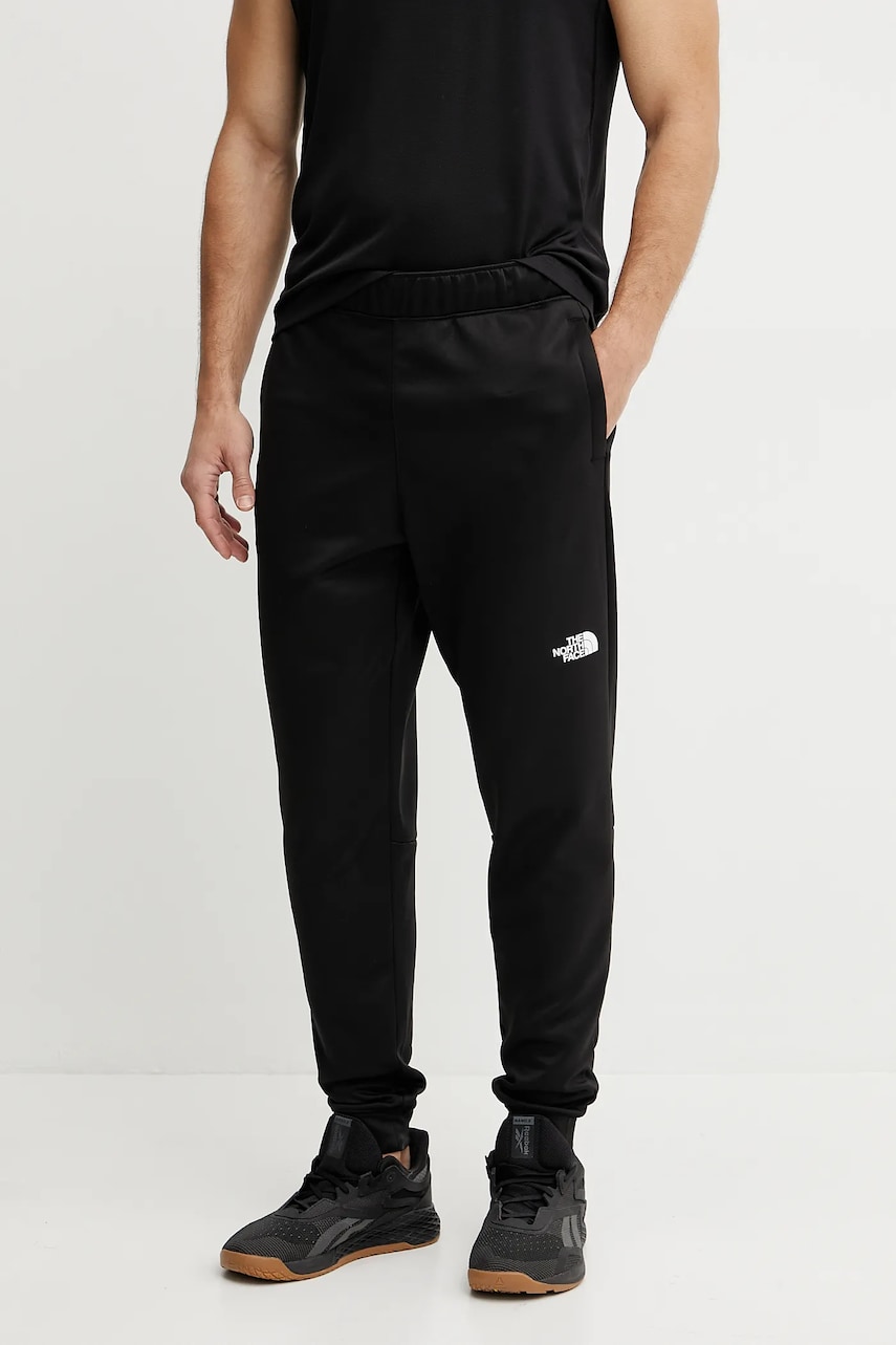 The North Face pantaloni de trening Reaxion culoarea negru, uni, NF0A8CNQJK31 The North Face pantaloni de trening Reaxion culoarea negru, uni, NF0A8CNQJK31