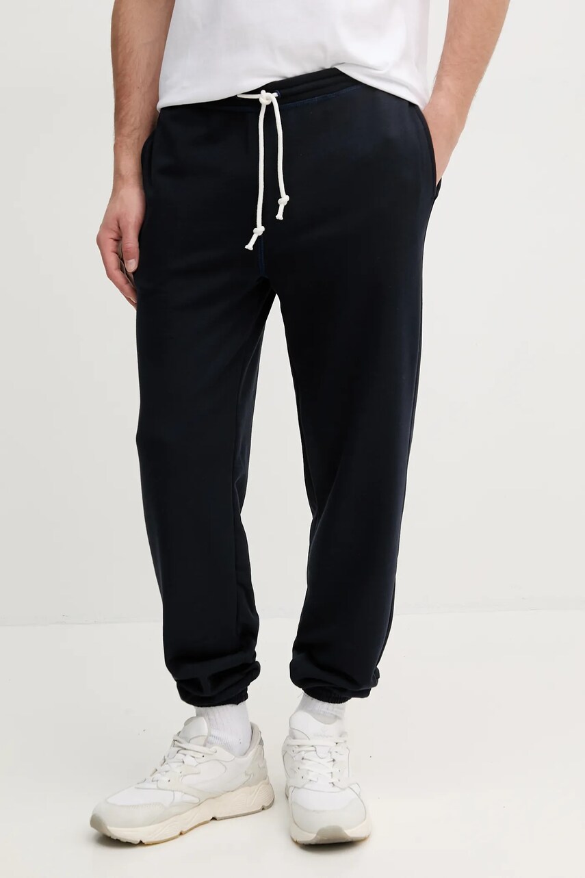 Levně Tepláky Tommy Hilfiger pánské, tmavomodrá barva, melanžové, UM0UM03513