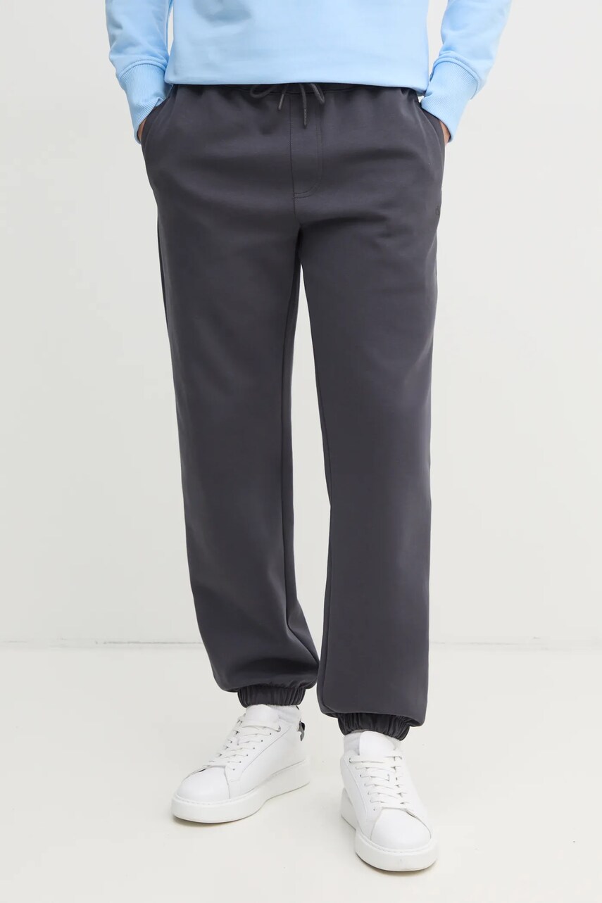 Levně Tepláky Calvin Klein Jeans šedá barva, hladké, J30J327241