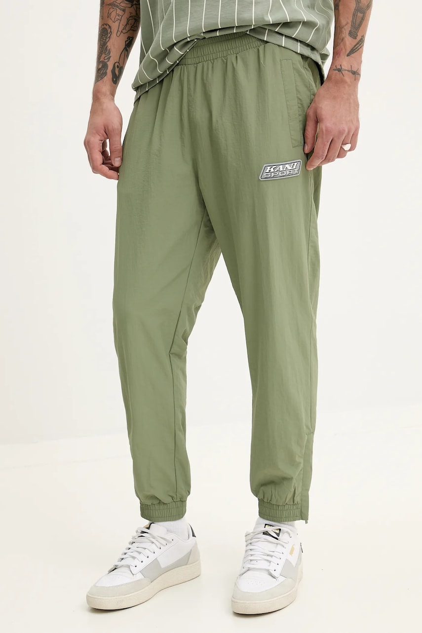 Karl Kani pantaloni de trening barbati, culoarea verde, cu imprimeu, 60060039 Karl Kani pantaloni de trening barbati, culoarea verde, cu imprimeu, 60060039