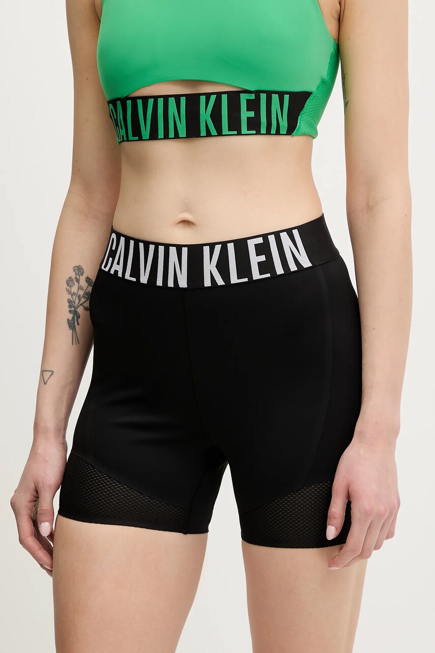 Levně Tréninkové šortky Calvin Klein Performance dámské, černá barva, s potiskem, high waist, LVGWS5L704