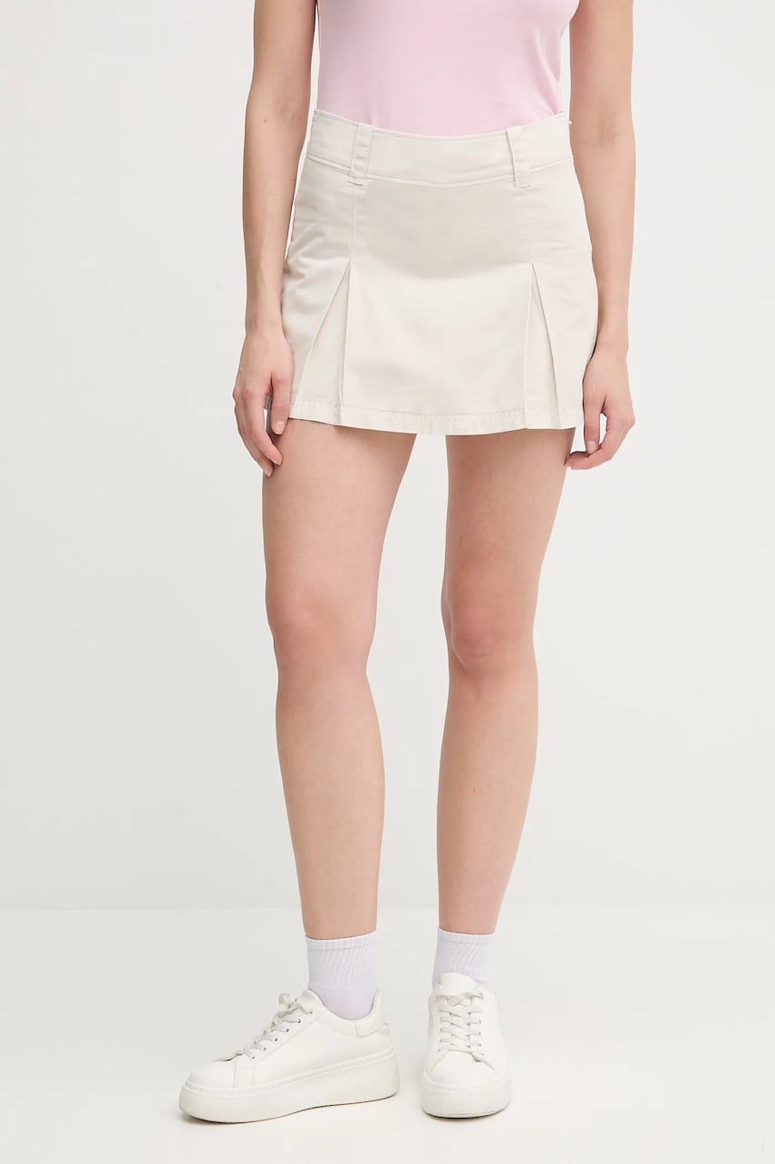 Levně Bavlněná kalhotová sukně Calvin Klein Jeans béžová barva, mini, áčková, J20J225215
