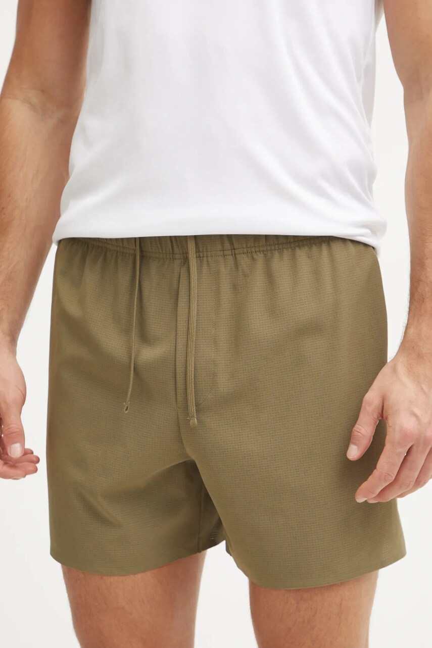 Levně Kraťasy Calvin Klein Performance pánské, zelená barva, LVGMS5S846