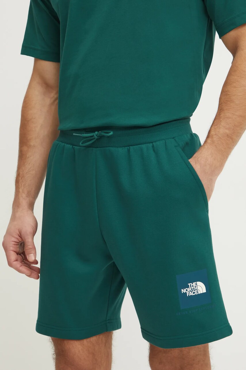 Levně Kraťasy The North Face Nuptse Regular pánské, zelená barva, NF0A8C1JA1B1