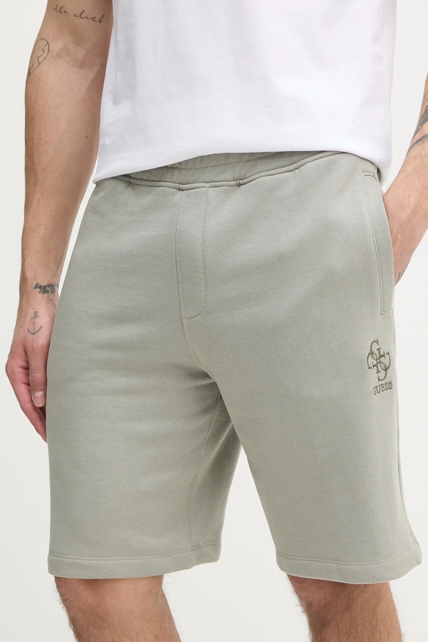 Levně Kraťasy Guess CLOVIS pánské, zelená barva, M5GD10 KCN01