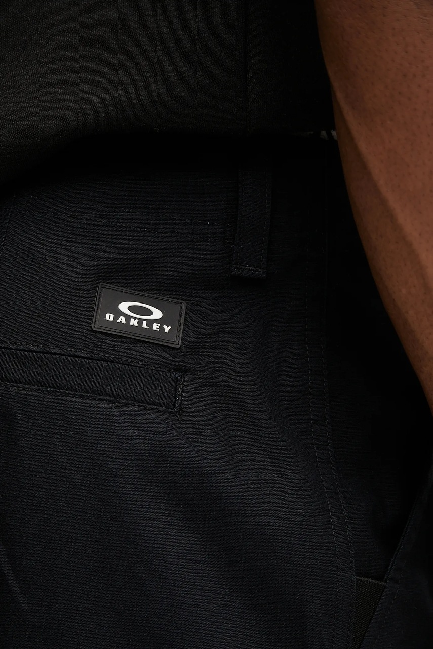 Βαμβακερό σορτσάκι Oakley ανδρικό, χρώμα: μαύρο, FOA406183 φωτογραφία
