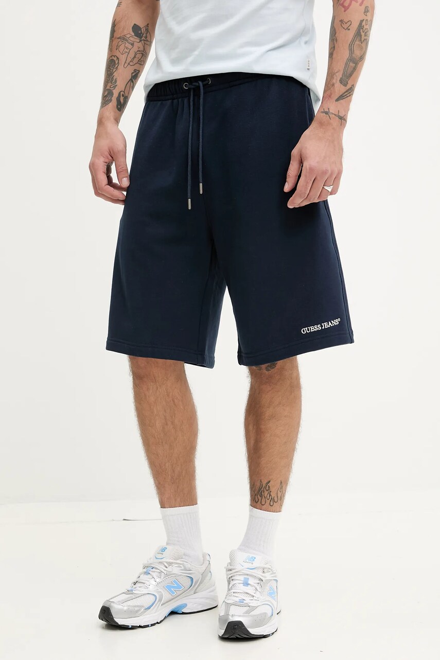 Levně Bavlněné šortky Guess Jeans pánské, tmavomodrá barva, M5GD49 KCPR1