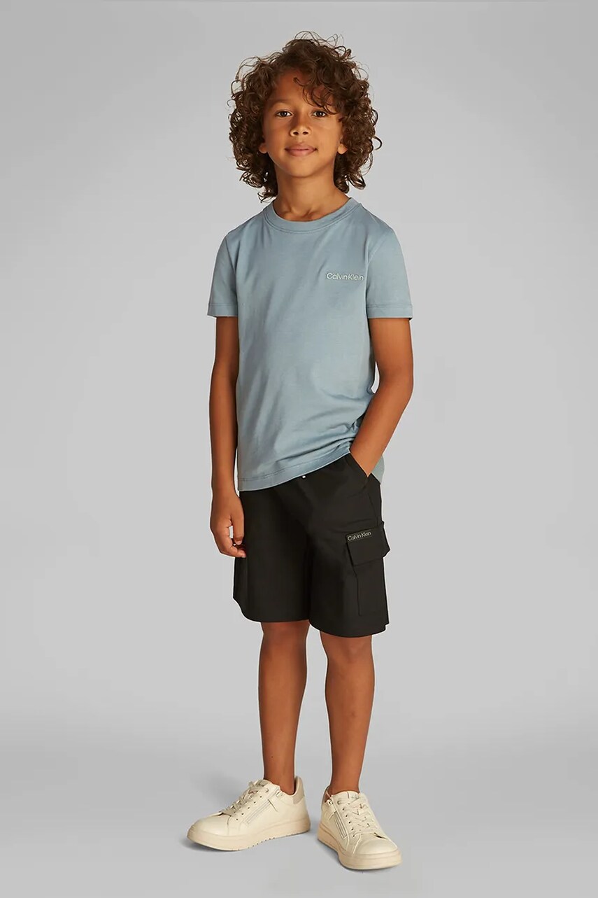 Levně Dětské bavlněné tričko Calvin Klein Jeans tyrkysová barva, s potiskem, IB0IB02454