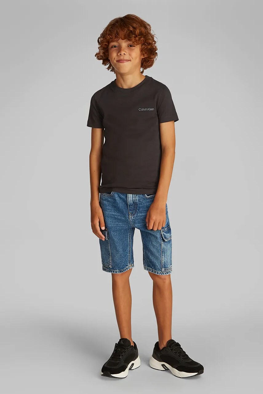 Levně Dětské bavlněné tričko Calvin Klein Jeans černá barva, s potiskem, IB0IB02454