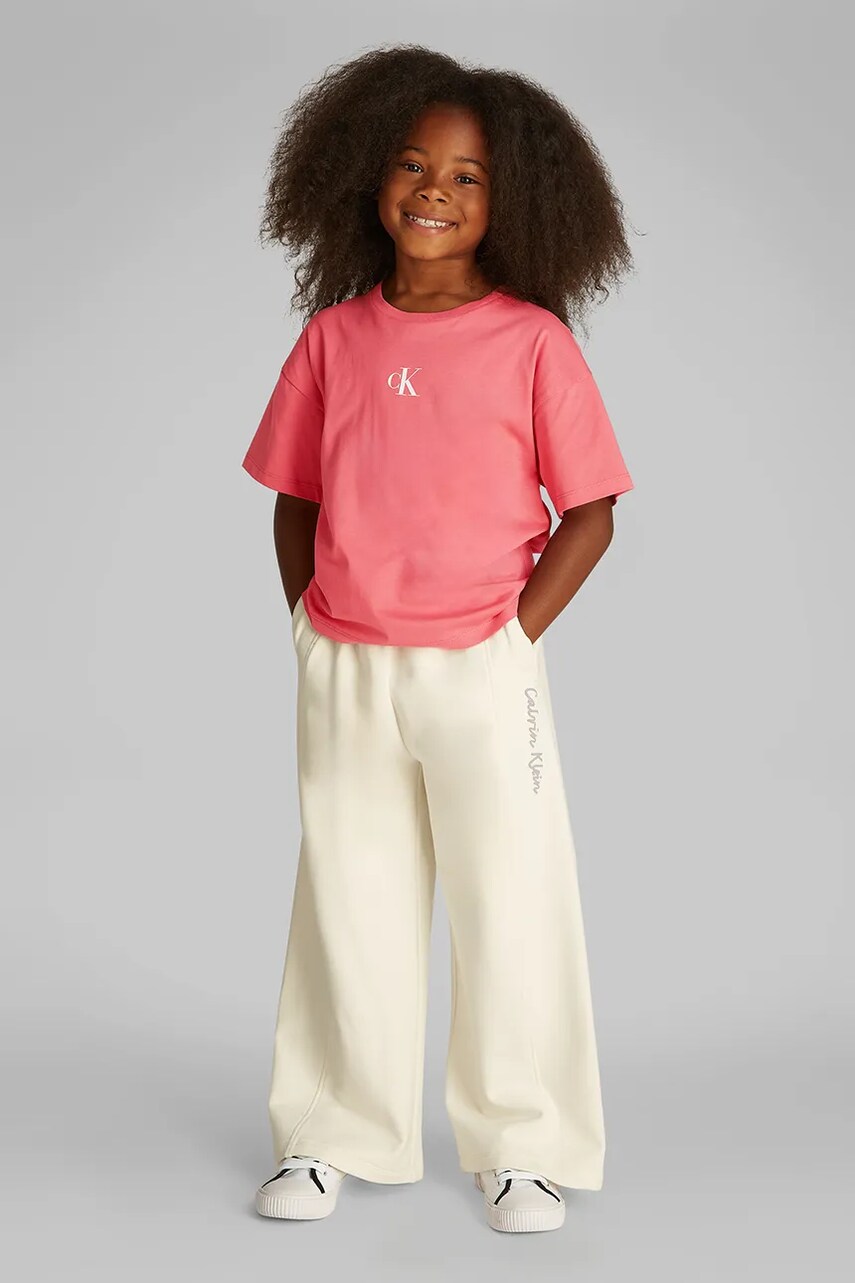 Levně Dětské bavlněné tričko Calvin Klein Jeans růžová barva, IG0IG02136