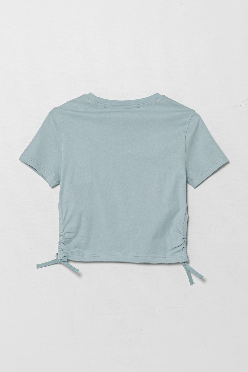 Детская хлопковая футболка Puma FLAMING LOVE Knotted Tee цвет бирюзовый 685108 Детская хлопковая футболка Puma FLAMING LOVE Knotted Tee цвет бирюзовый 685108