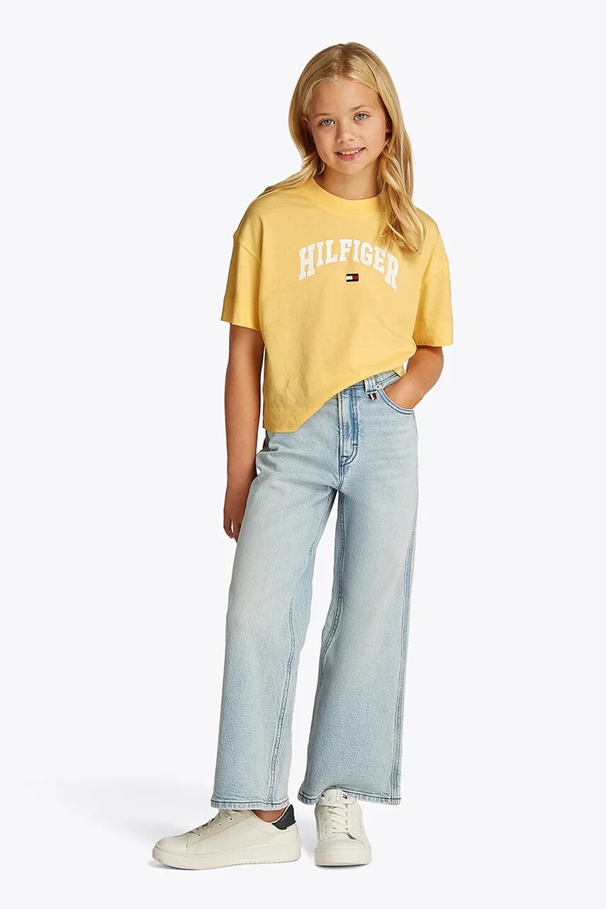 Levně Dětské bavlněné tričko Tommy Hilfiger žlutá barva, KG0KG08549
