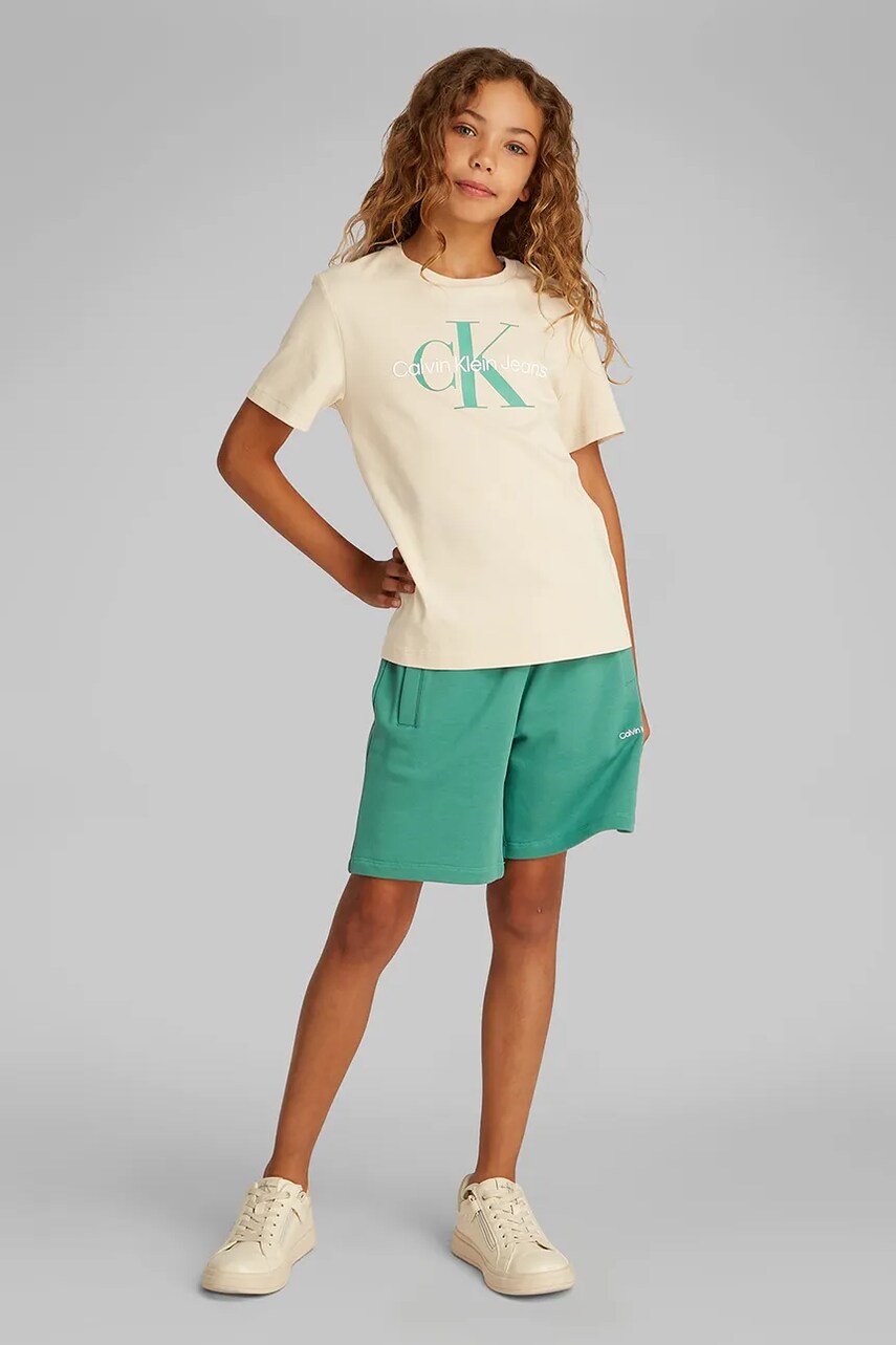Levně Dětské bavlněné tričko Calvin Klein Jeans béžová barva, s potiskem, IU0IU00676