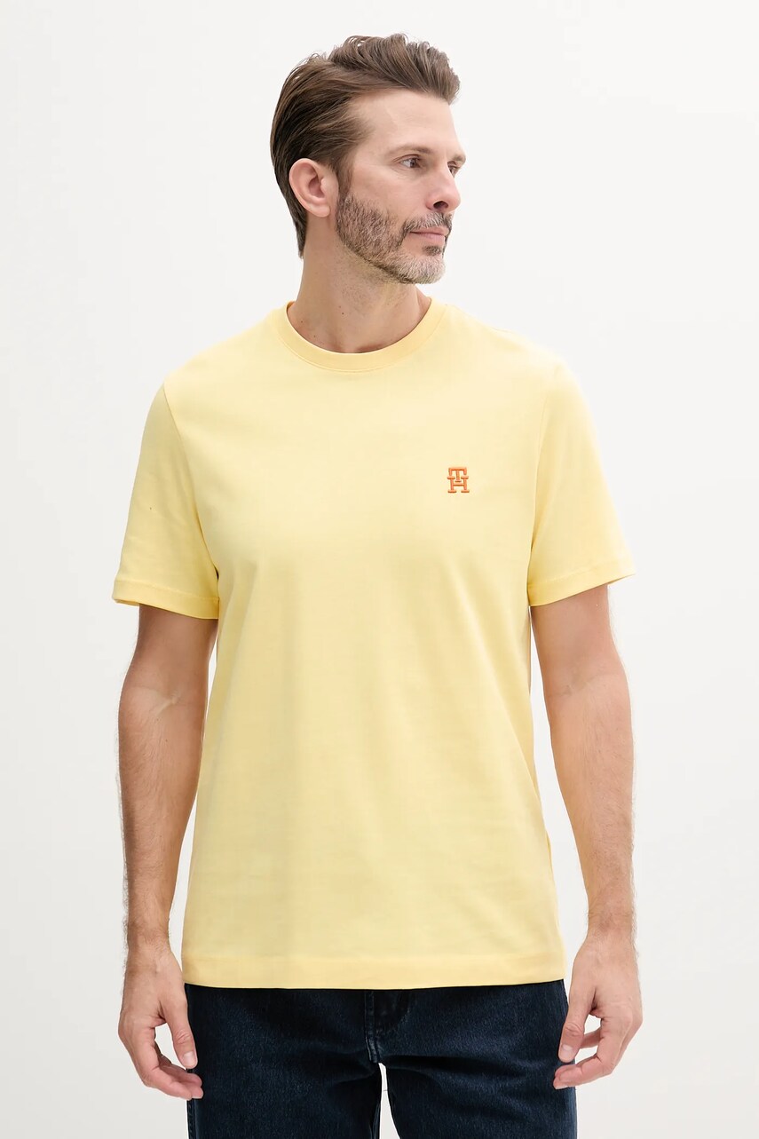 Levně Bavlněné tričko Tommy Hilfiger žlutá barva, s aplikací, MW0MW39256