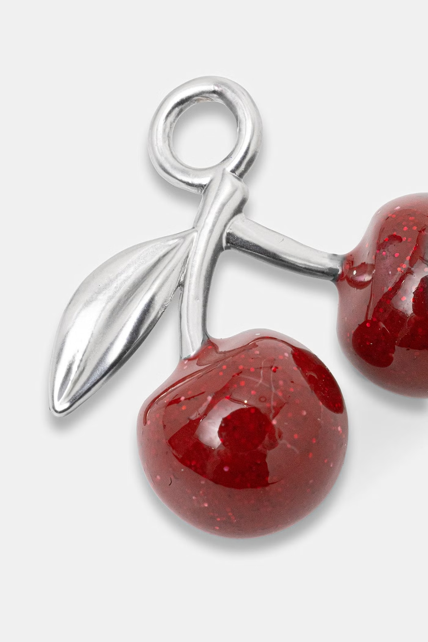 Coach ozdobný prívesok dámsky kovový Cherry Shoe Charm