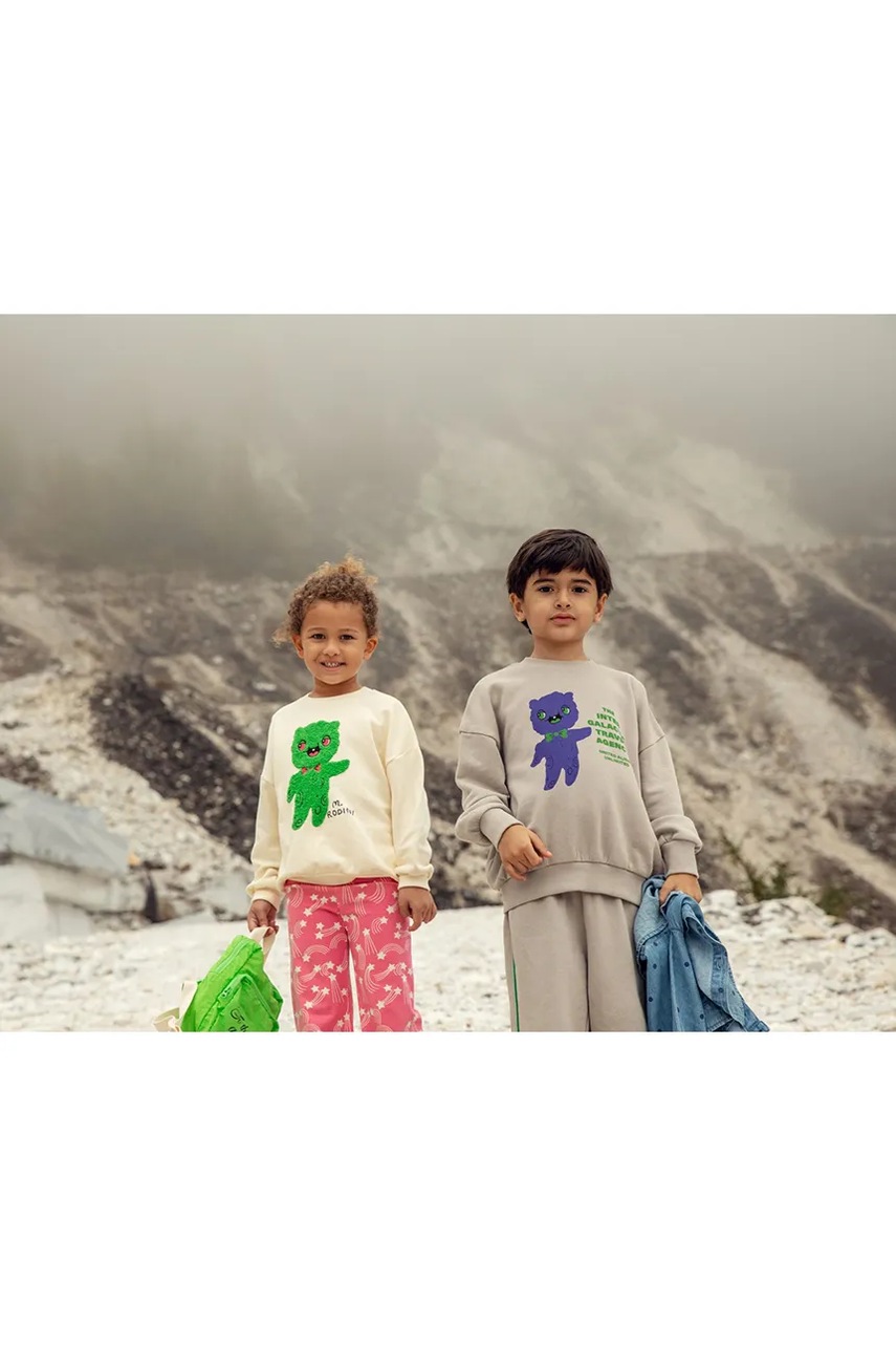 Παιδική βαμβακερή μπλούζα Mini Rodini Alien travel agency φωτογραφία