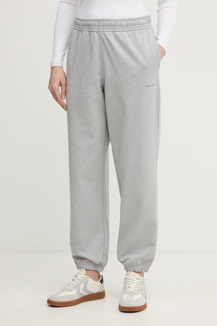 Levně Tepláky Calvin Klein Jeans dámské, šedá barva, s potiskem, LV047E826G