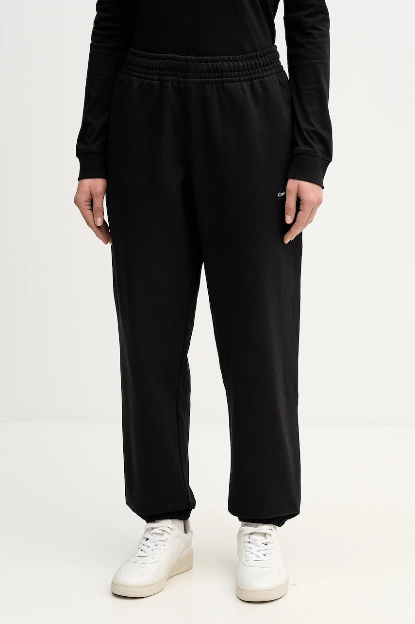 Levně Tepláky Calvin Klein Jeans dámské, černá barva, s potiskem, LV047E826G