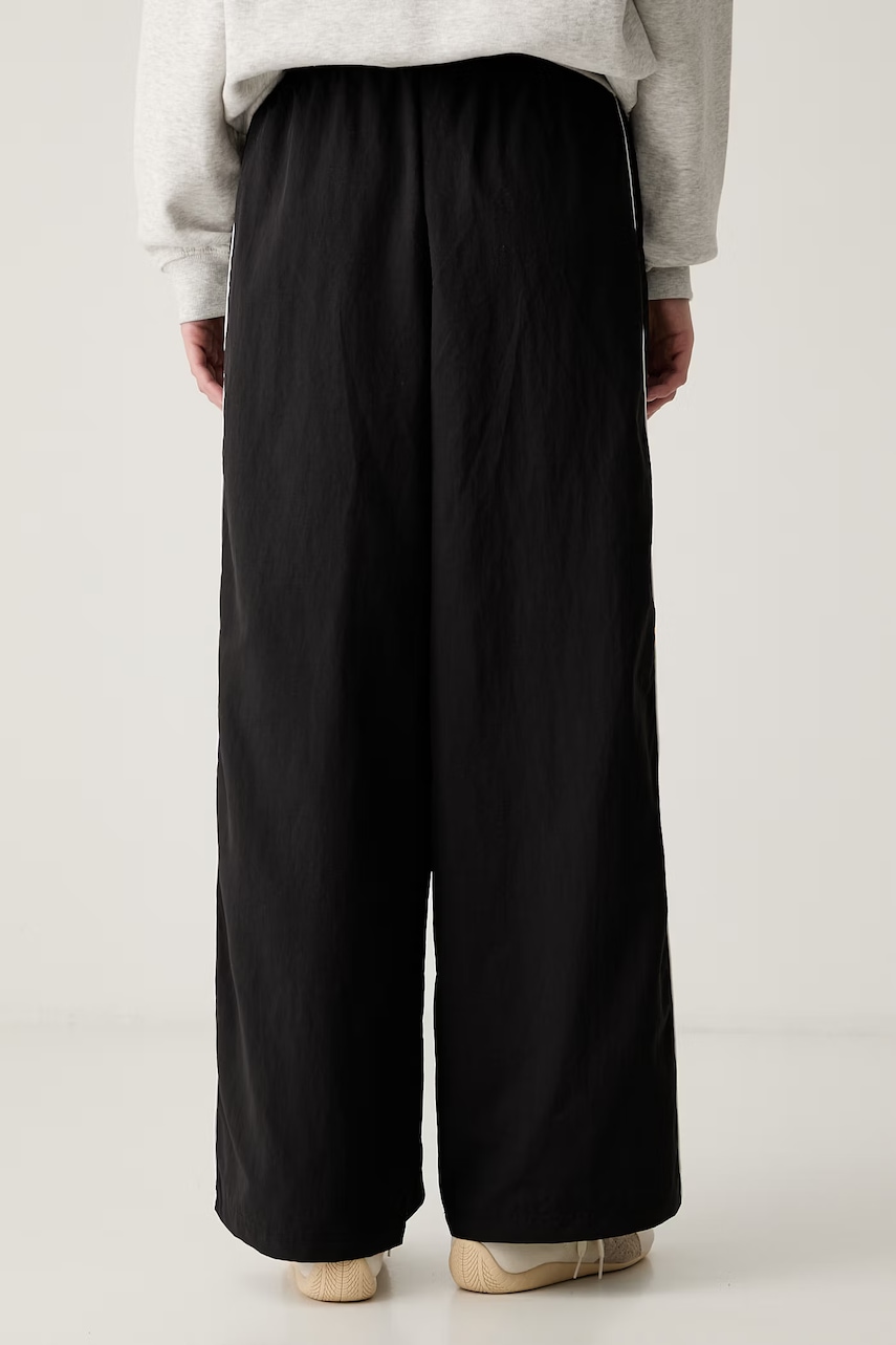 Puma teplákové nohavice dámske Piping Relaxed Woven
